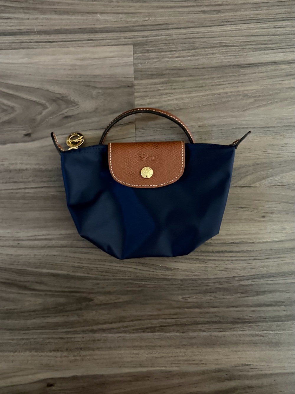 Longchamp NWOT mini tote in navy with brown leather trim